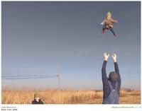 Artist: Julie Blackmon Title: Baby Toss Year 2009 Medium: Archival Pigment Print Size: 22 x 29 inches Edition of 25 Courtesy of photo-eye Gallery 